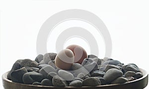 2 brown eggs with hard stones pebbles