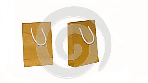 2 brown paper bags that cut off the background, forming a white