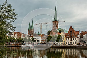 2 churches seen from over Trave river, Lubeck, July 13, 2022