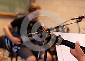 2 Guitarists in rehearsal