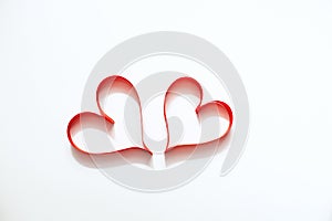 2 hearts of red satin ribbon