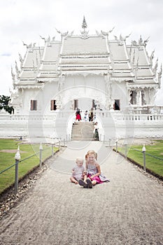 2 little girls (tourist) by Wat Rong Khun photo