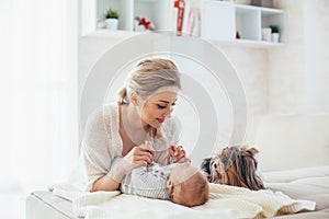 2 month old baby with mom and dog
