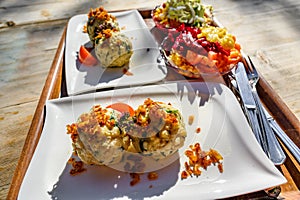 2 portion of vegetarian herbs dumplings with vegetable salads