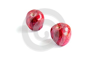 2 red apples set apart from the top corner and isolated on white background, red apples on a white background for product advertis