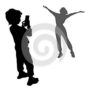 2 vector silhouettes. Girl posing with arms outstretched to the sides. Black silhouette of a little boy, a child stands