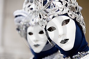 2 Venetians in carnival masks photo