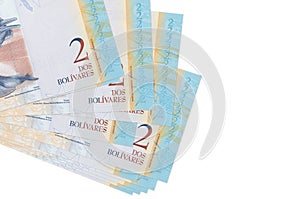 2 Venezuelian bolivar bills lies in small bunch or pack isolated on white. Mockup with copy space. Business and currency exchange