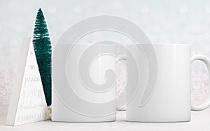 2 White blank coffee mugs Christmas theme mock up.