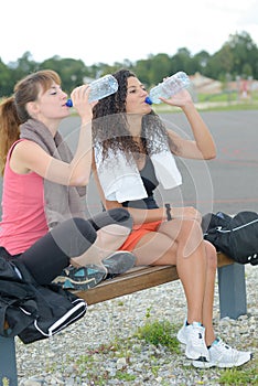 2 women quenching thirst