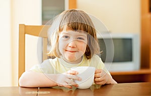 2 years child drinking from cup