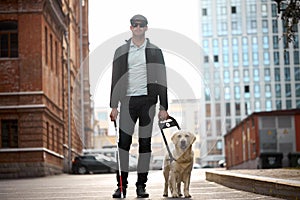 20-25 years old eyeless man with guide dog