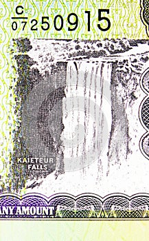 20 Dollars banknote, Bank of Guyana, closeup bill fragment shows Kaieteur Falls on the Potaro River in central Guyana