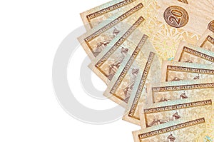 20 Dominican peso bills lies isolated on white background with copy space. Rich life conceptual background