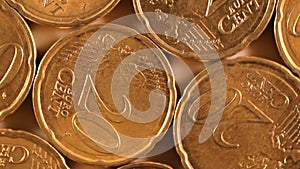 20 euro cent coins, rotating money background