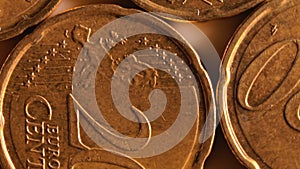 20 euro cent coins, rotating money background