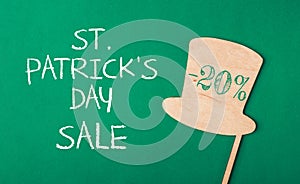 -20 sale on Patrick's Day on paper background