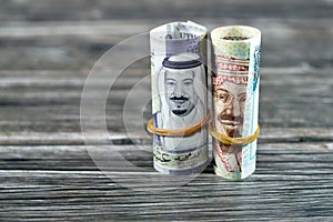 20 SAR Twenty Saudi Arabia money roll riyals banknotes, Saudi riyals cash money bills rolled up with rubber bands features images