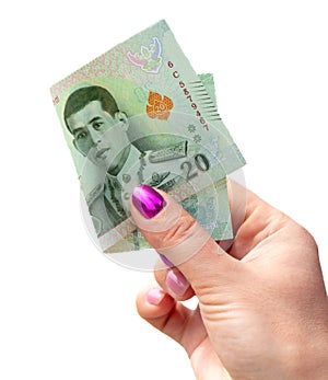 20 Thai Baht in hand  on white background