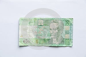 20 UAH counterfeit on a white background close-up