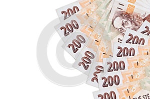 200 Czech korun bills lies isolated on white background with copy space. Rich life conceptual background