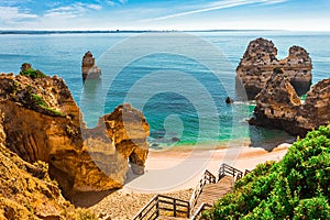 200 wooden stairs leading to Praia do Camilo, Algarve, Portugal