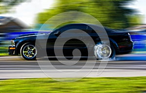 2009 Ford Mustang Race Car in Motion