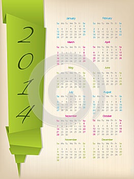 2014 calendar with green origami arrow