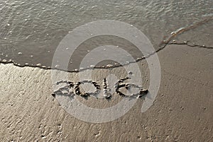 2016 text written on sand