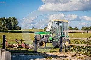 2016 United Kingdom Mersea tractor to gather golf balls on a golf field, mower