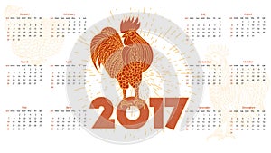 2017 calendar with red rooster. White background