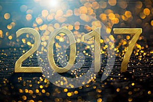 2017 Happy New Year background with gold light background