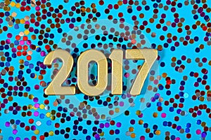 2017 year golden figures and varicolored confetti