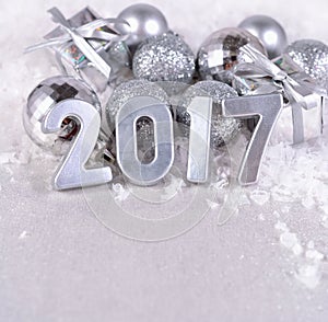2017 year silver figures and silvery Christmas decorations