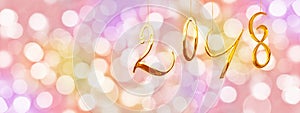 2018 golden numbers, holiday colorful background with blurred lights