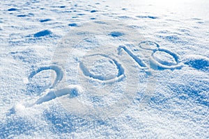 2018 handwritten on the snow