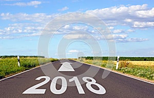 2018 - street with arrow and year