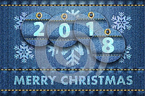 2018 year digits and Merry Christmas greetings on blue jeans background