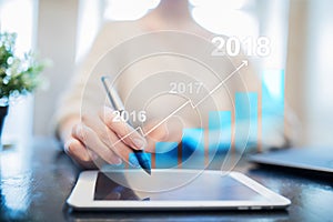 2018 year profit growth chart, Business, finance and investment concept on virtual screen. Goals setting on improvement.