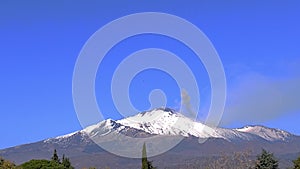 2019.11.27 Sicily. Italy. Etna volcano, snow  during an eruptive phase.