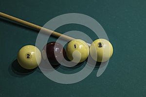2019 from billiard balls and cue on green pool table. New Year concept.