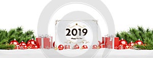 2019 card greetings laying on red baubles and gift 3D rendering