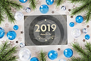 2019 greetings card with blue baubles 3D rendering