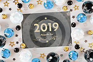2019 greetings card with blue baubles 3D rendering