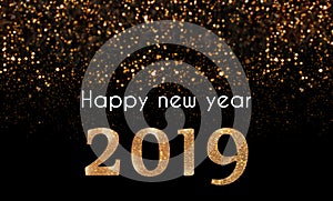 2019 Happy New Year card with golden, sparkling glitter falling on 2019 numbers