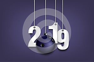 2019 New Year and bowling ball hanging on strings