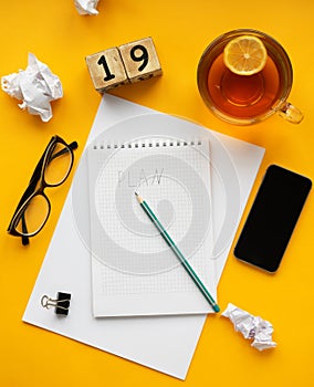2019 new year goal,plan,action text on notepad with office accessories