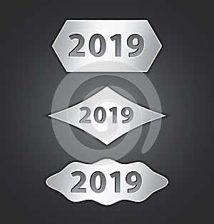 2019 text on metallic shiny buttons