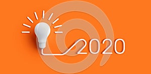 2020 creativity inspiration concepts with lightbulb on color background.Business solution