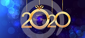 2020 Happy New Year hanging golden shiny numbers with ribbon bows on abstract blue background with lights and bokeh effect.